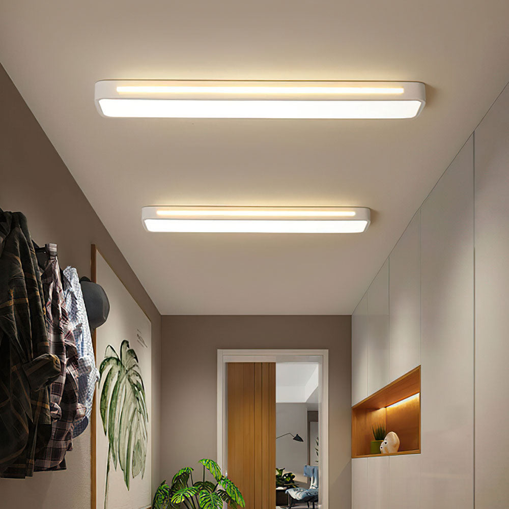 Korra Long LED Ceiling Light in Minimalist Black or White Finish